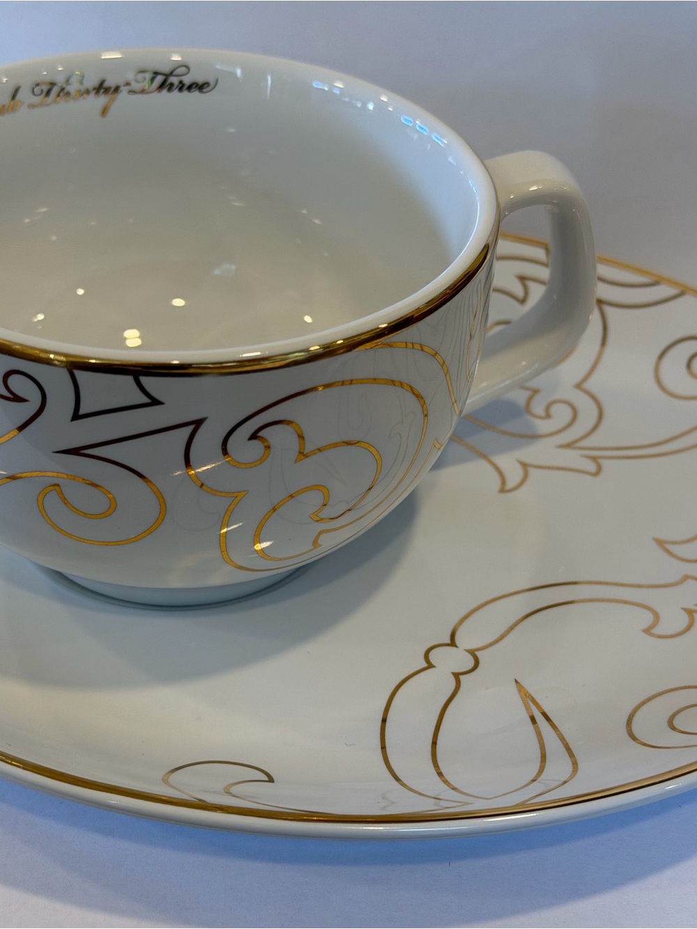 Disney Club 33 Elegant White and Gold Porcelain Teacup & Saucer Set